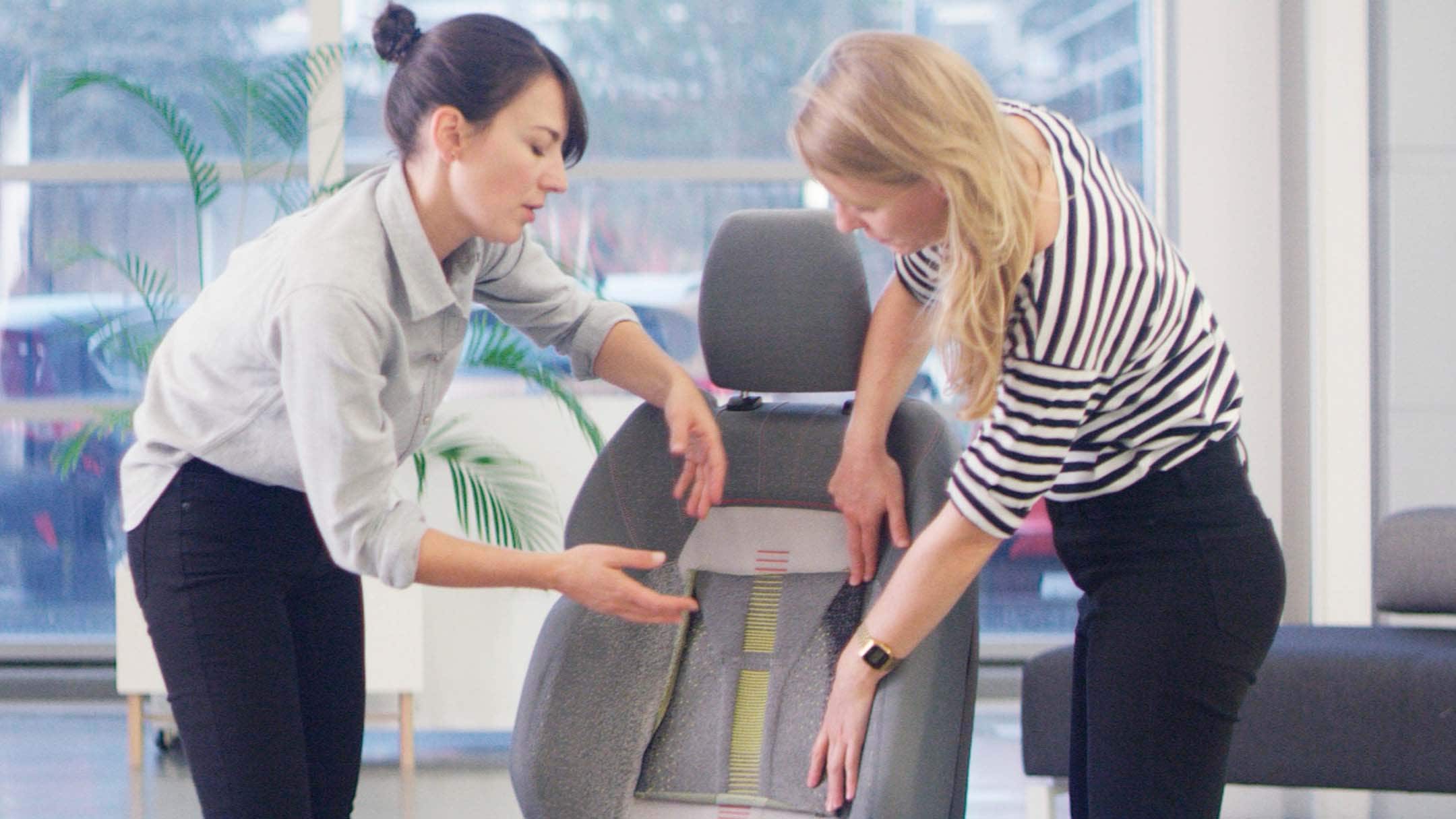 Ford interns designing a car seat