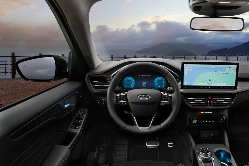 Interior of a Ford self-charging hybrid car and in-vehicle navigation screen.