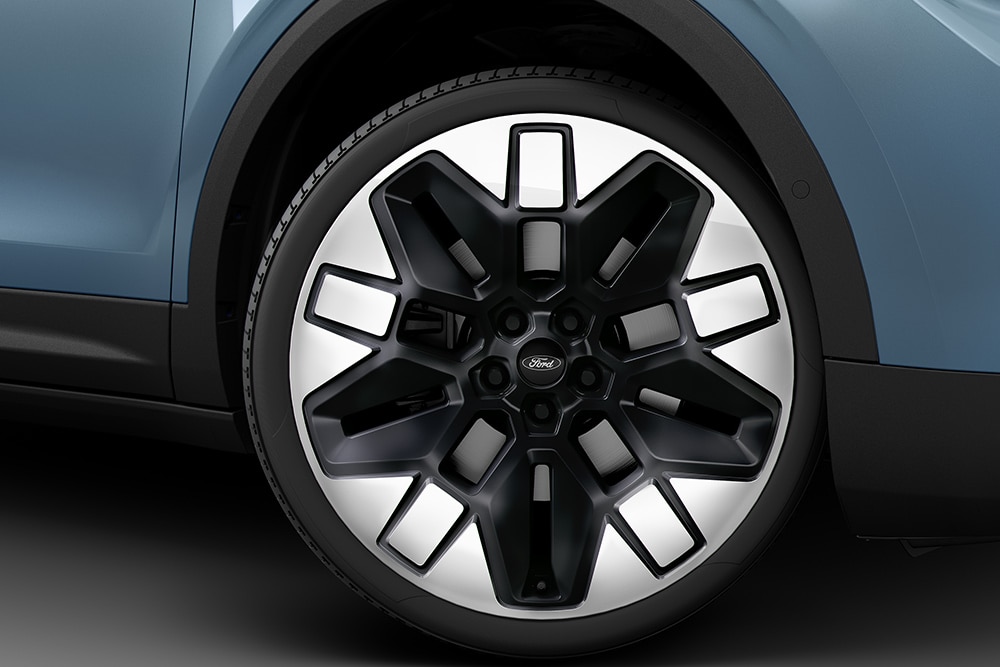 Close up view of the wheel of a Ford electric vehicle.