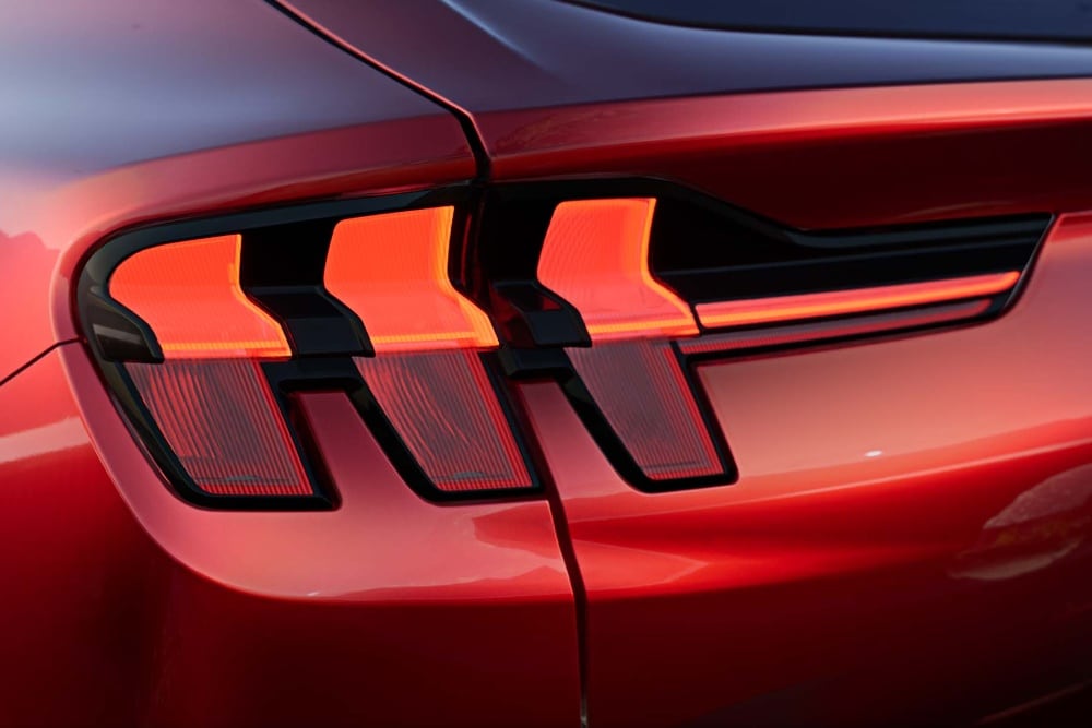 Stop light on red Ford Mustang Mach-E