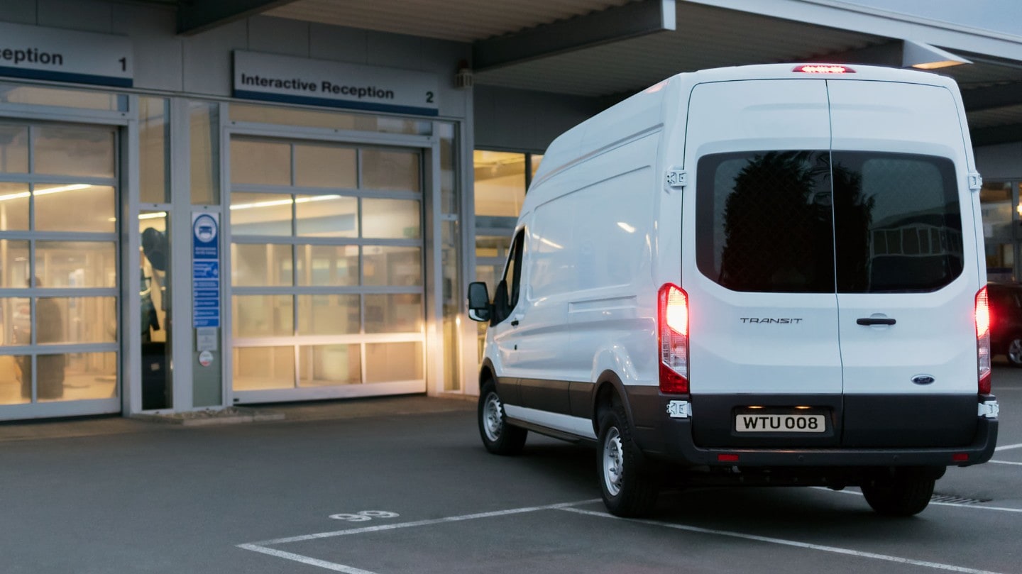 Ford Transit parked in front of Ford Office