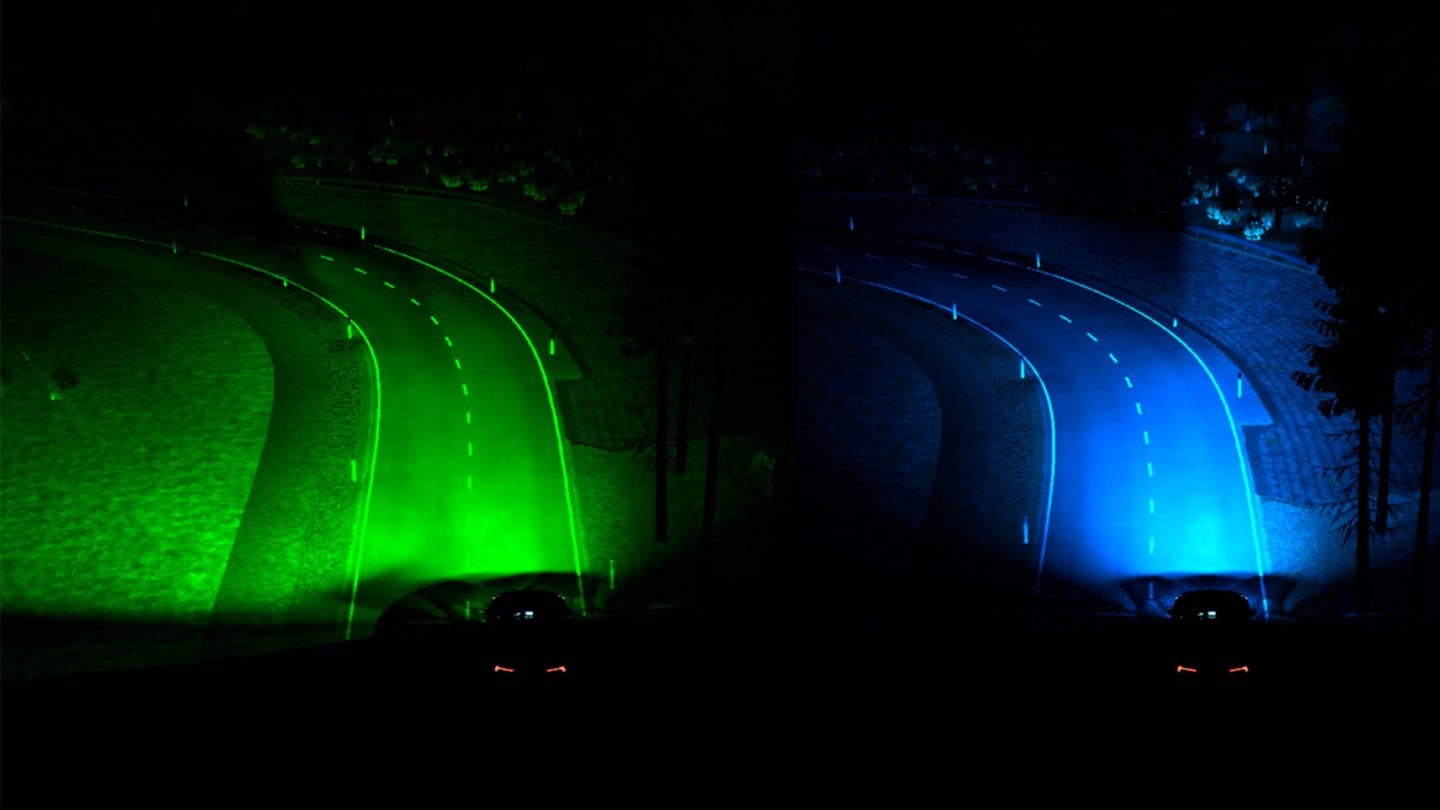 Two images demonstrating the predictive dynamic bending headlights, one using green light and one using blue light.