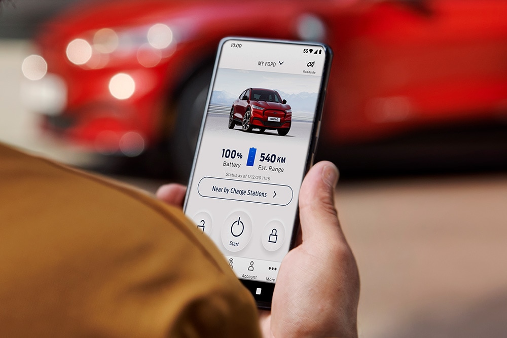A person looking at the FordPass App.