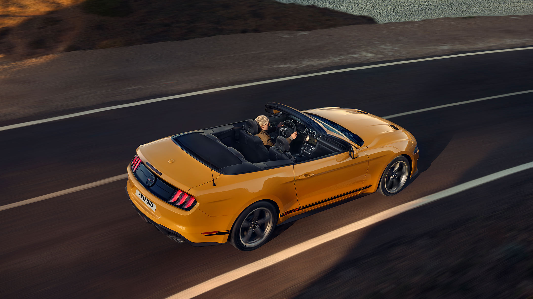 Ford Mustang California Edition viewed from above driving along a highway