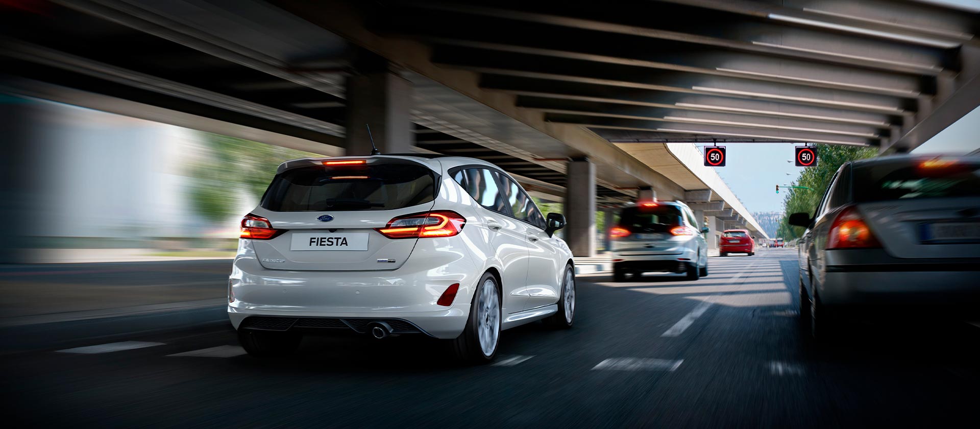 A silver Ford Fiesta Zetec, also known as the Fiesta Style, driving along a motorway