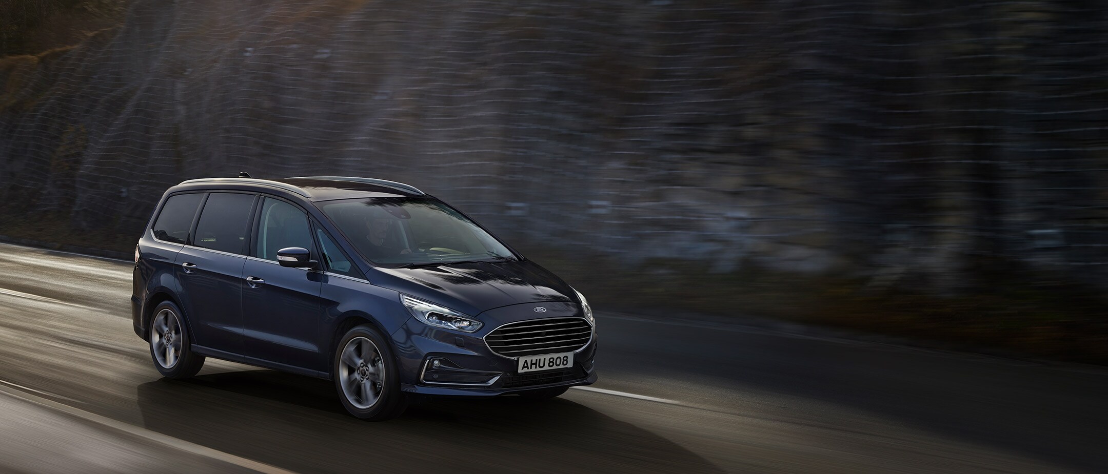 Ford Galaxy in motion front three quarter view