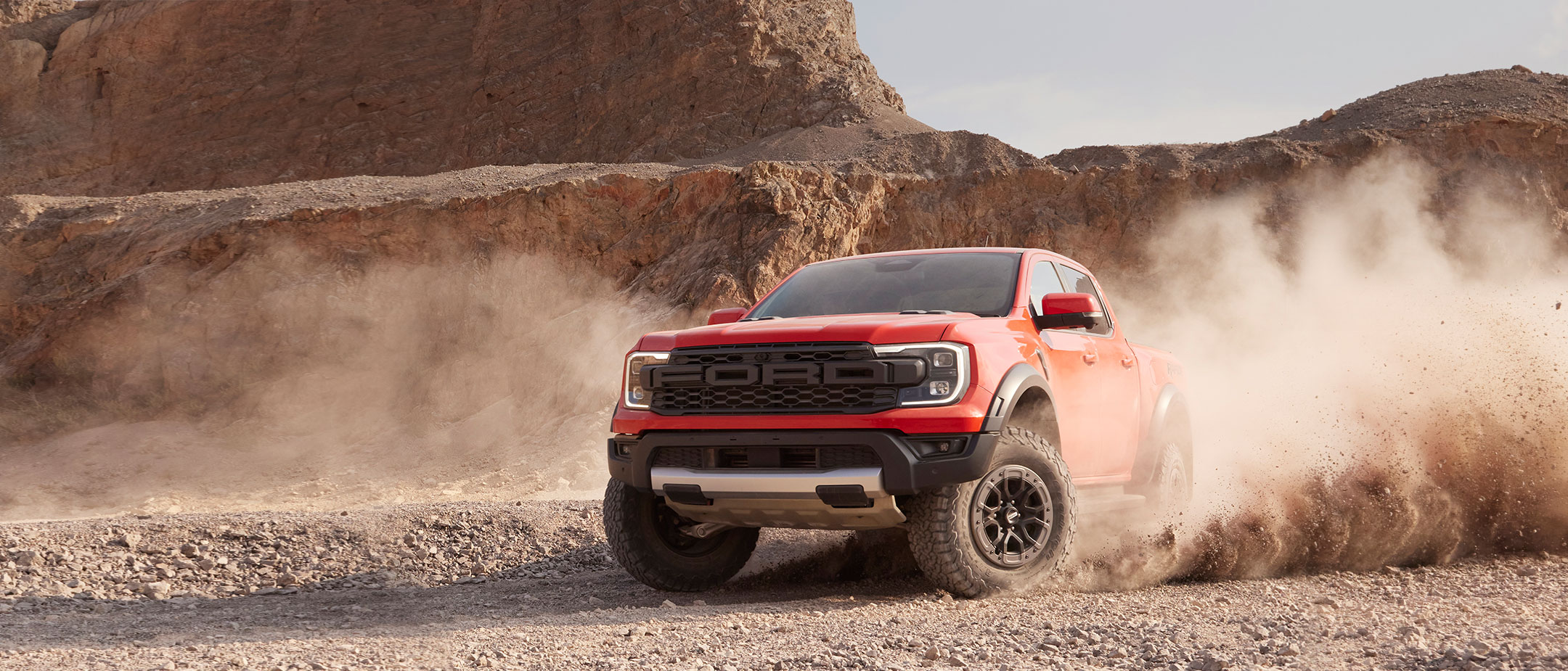 Ford Ranger front view driving rocky terrain