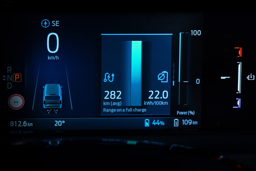 The digital instrument panel of the Ford Tourneo Custom display information including speed, power, and range.