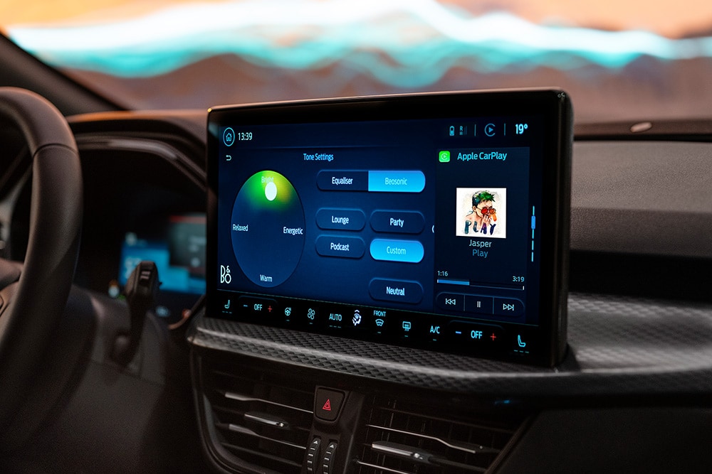 A close up of large touchscreen infotainment system showing the B&O Beosonic feature in the Ford Puma Gen-E Sound Edition.