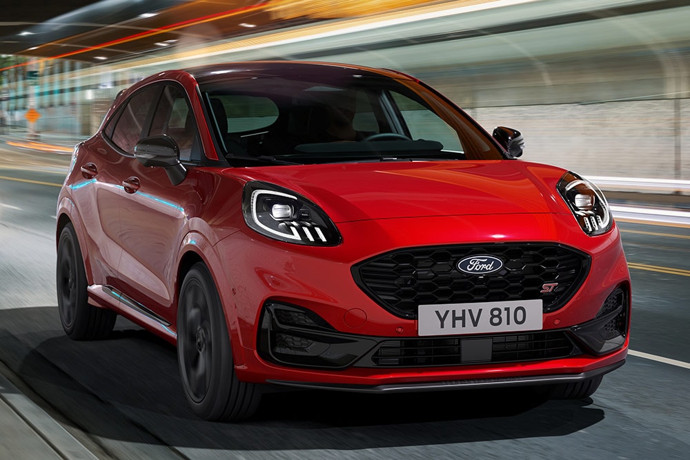 Red Ford Puma ST driving front view