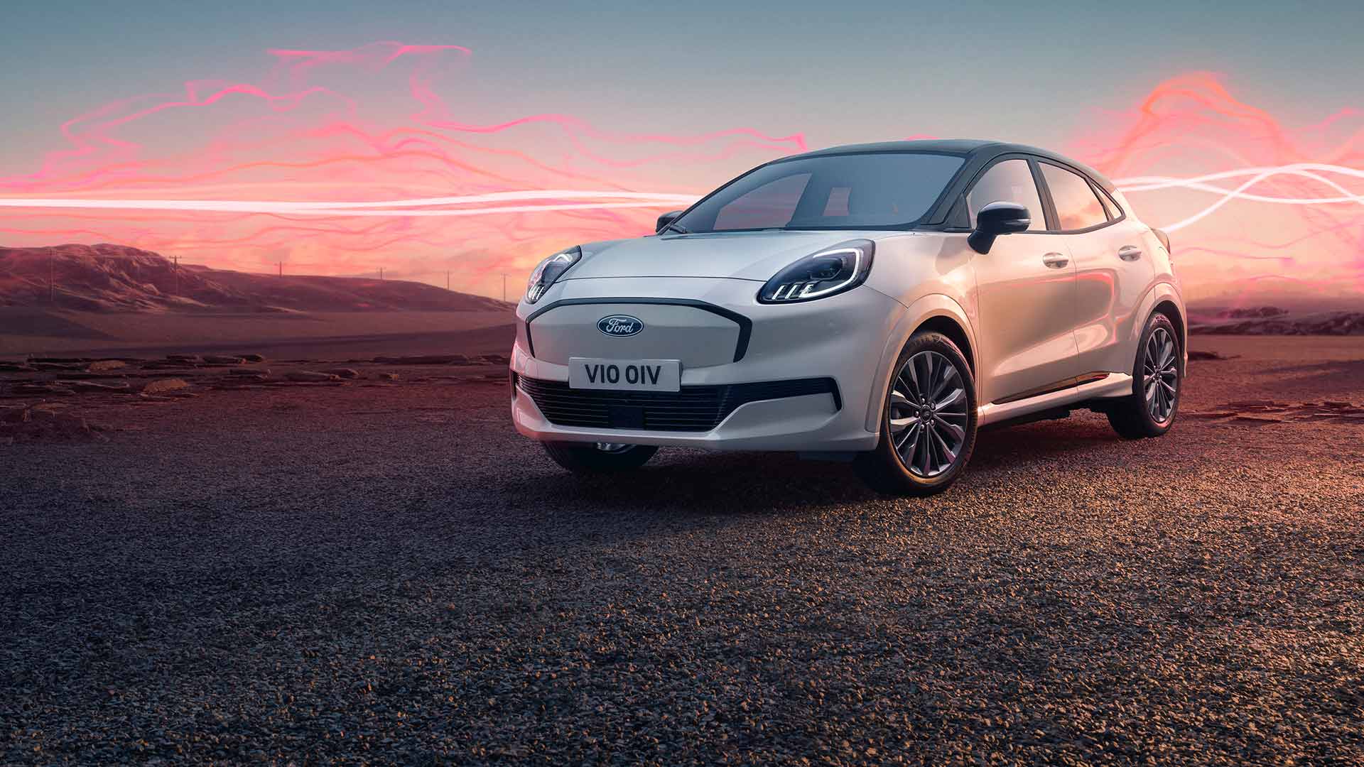 The Ford Puma Gen-E Sound Edition model in white, parked with red soundwave graphics in the background.