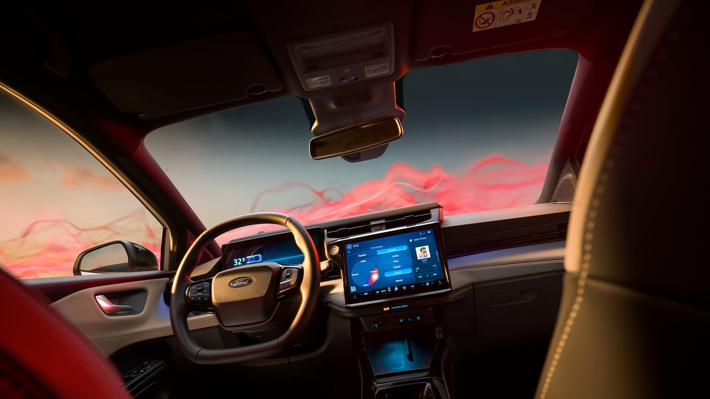The interior of the Ford Puma Sound Edition showing the steering wheel and infotainment screen.