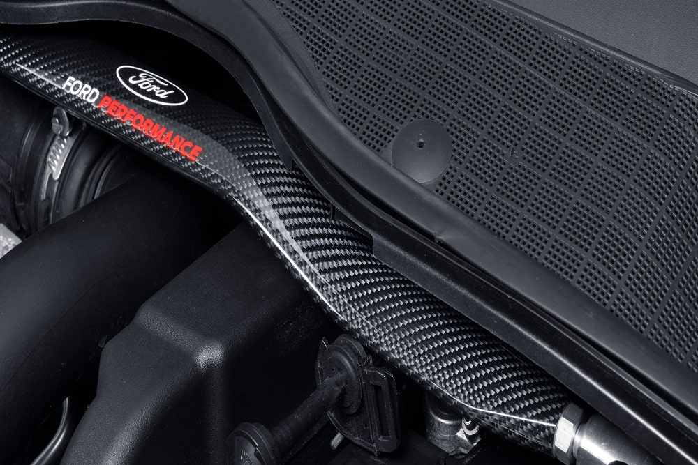Close-up detail of a Ford Performance engine component inside the engine bay.