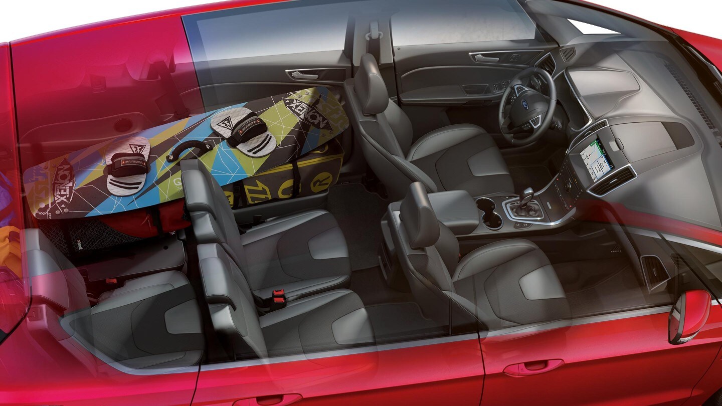 FORD S-MAX in red with masses of Interior Storage with snow boards and bags in the back and four free seats