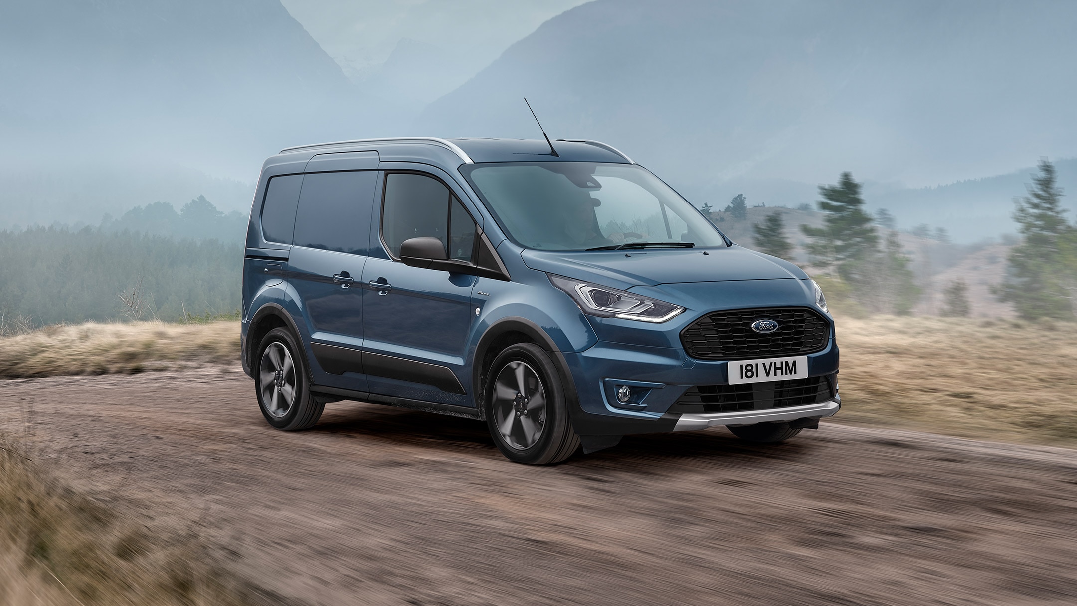 Ford Transit Connect Active parked on a  mountain road