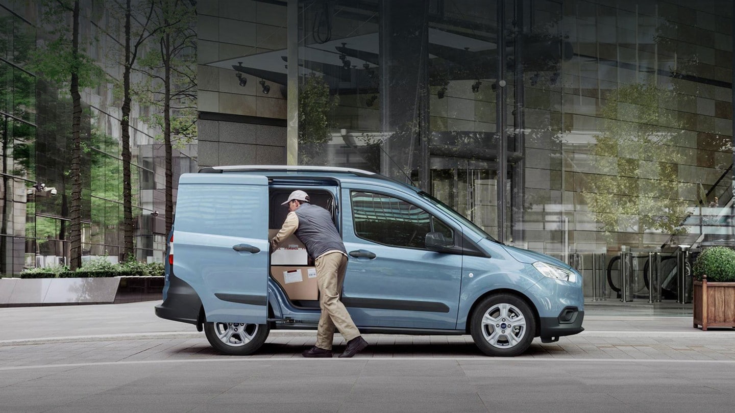 Ford Transit Courier loaded from side doors