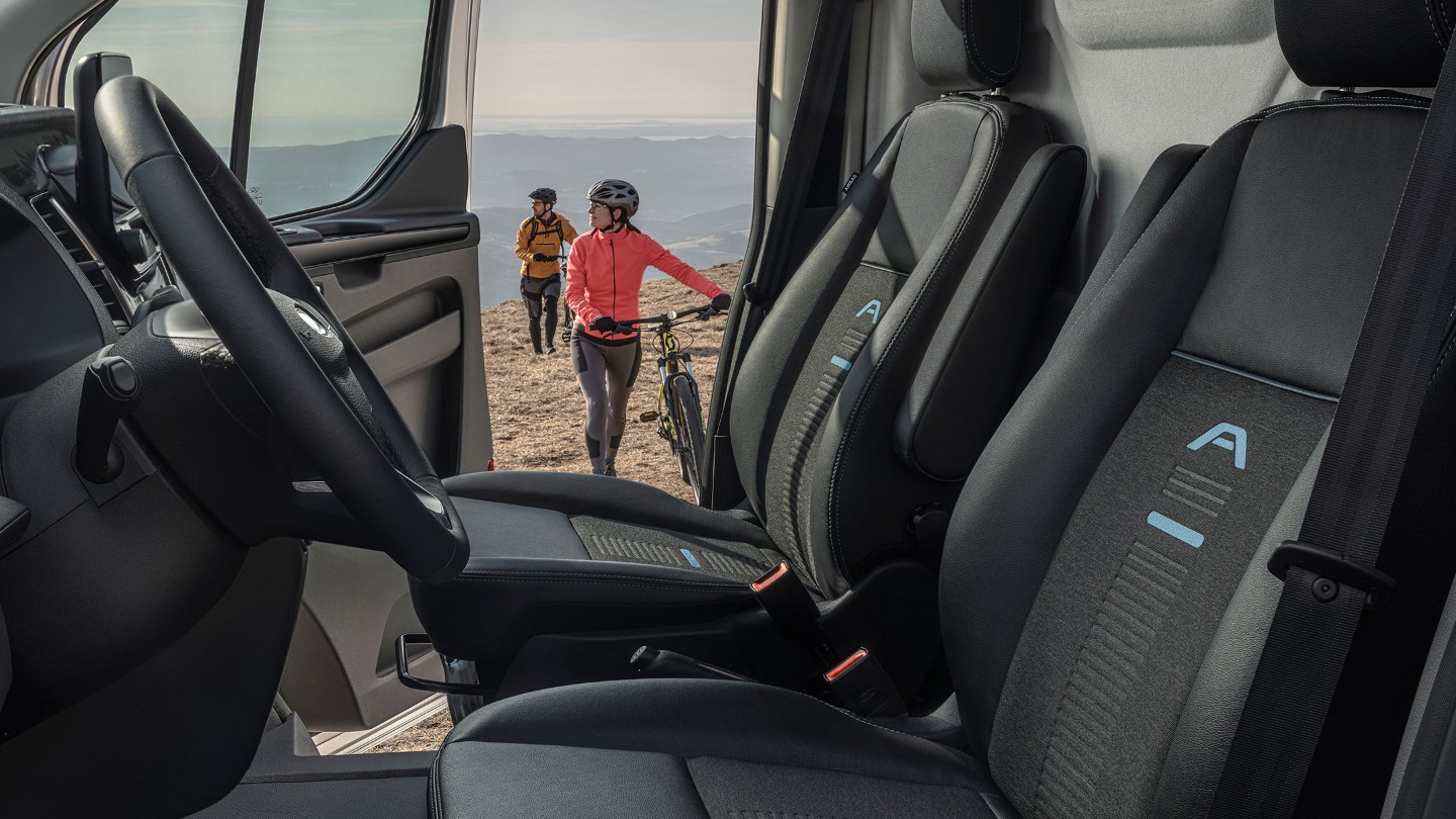 Ford Transit Custom Active inside view with door open and two cyclists walking