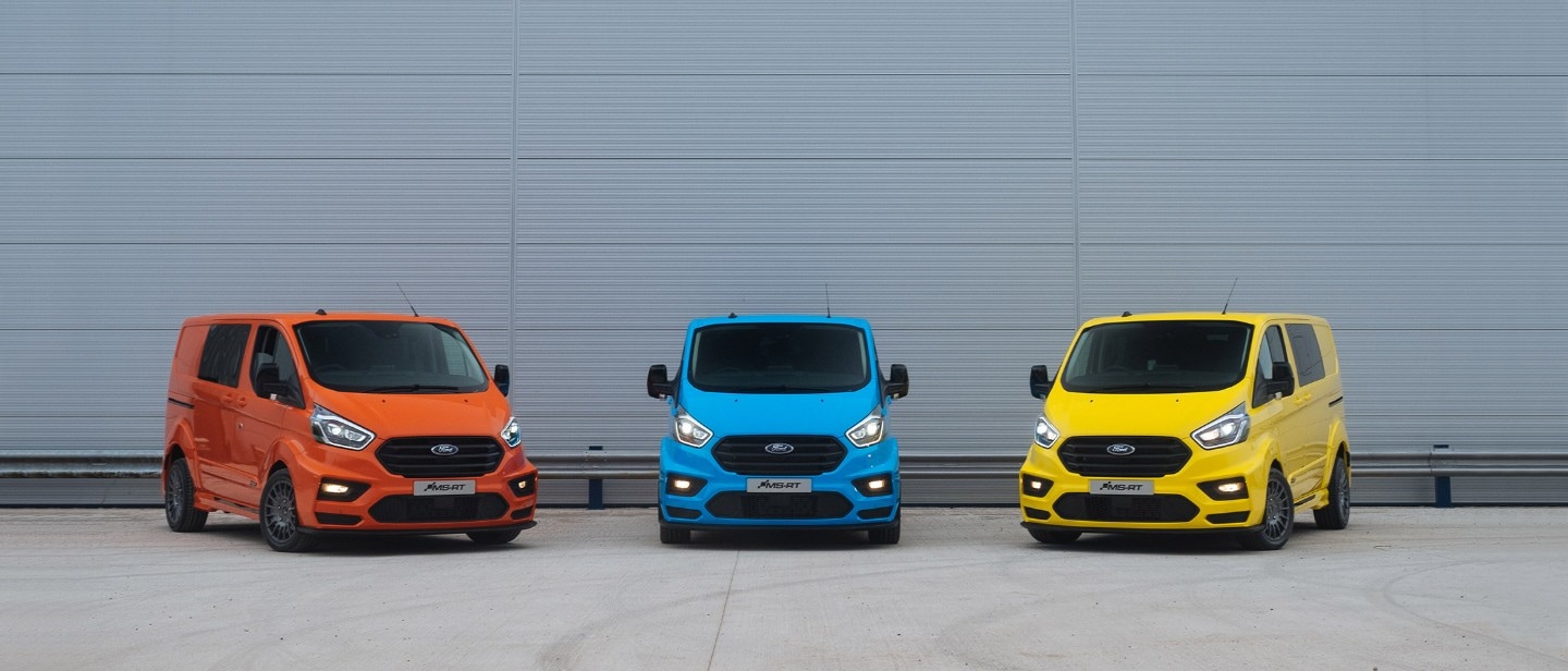 3 Ford Transit Custom MS-RT vans parked inside a warehouse