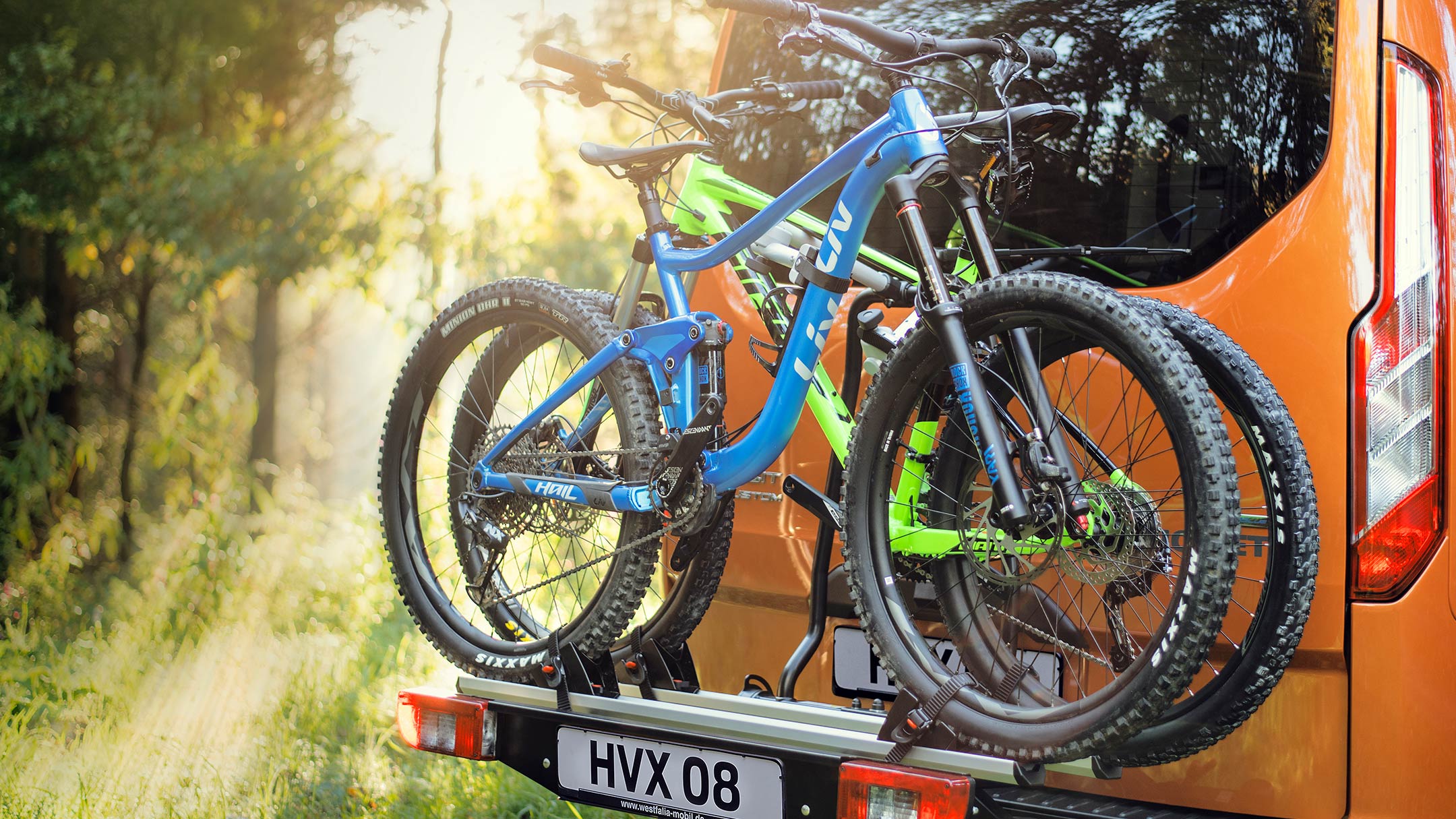 Orange Ford Transit Custom Nugget rear view of bike rack Orange Ford Transit Custom Nugget rear view of bike rack