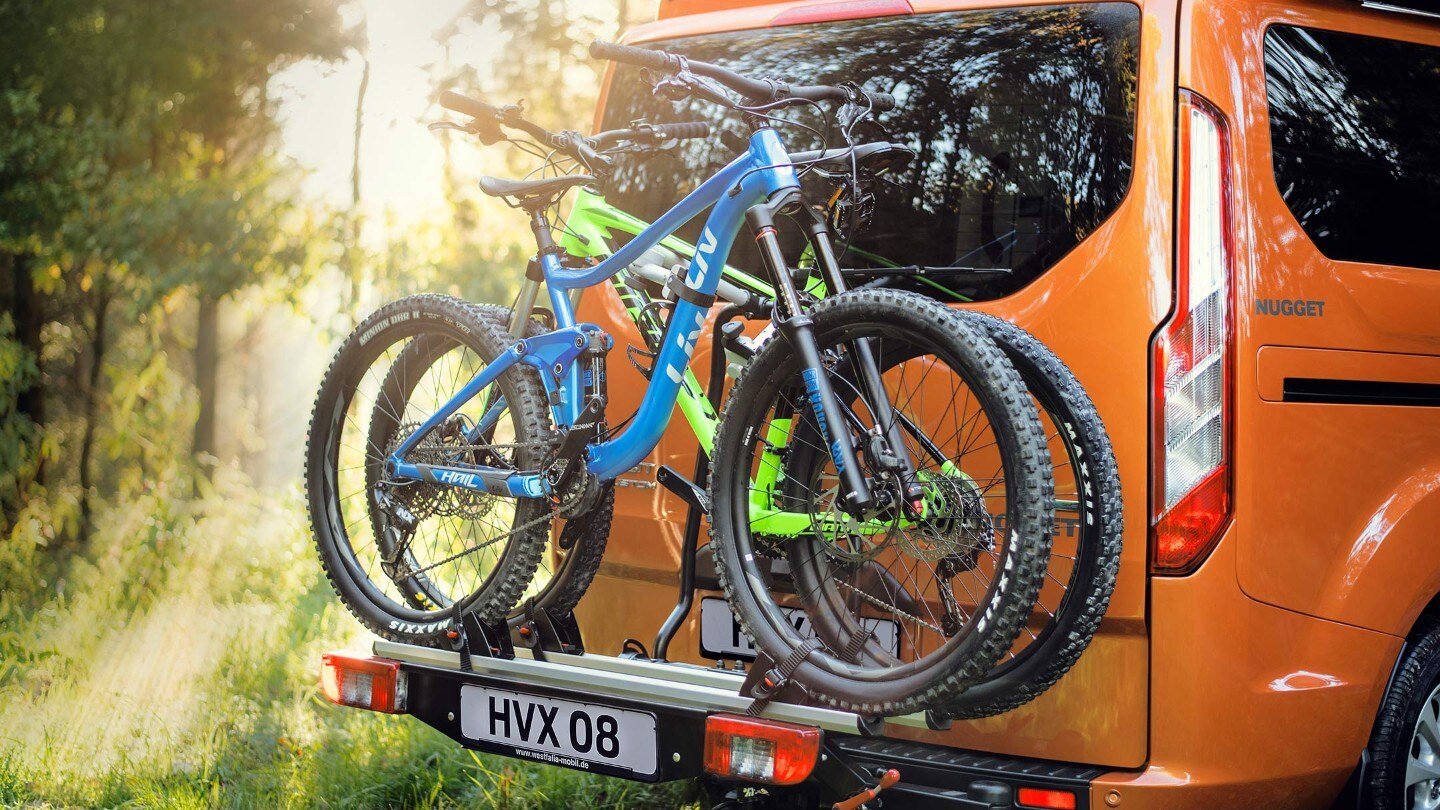 Orange Ford Transit Custom Nugget rear view of bike rack