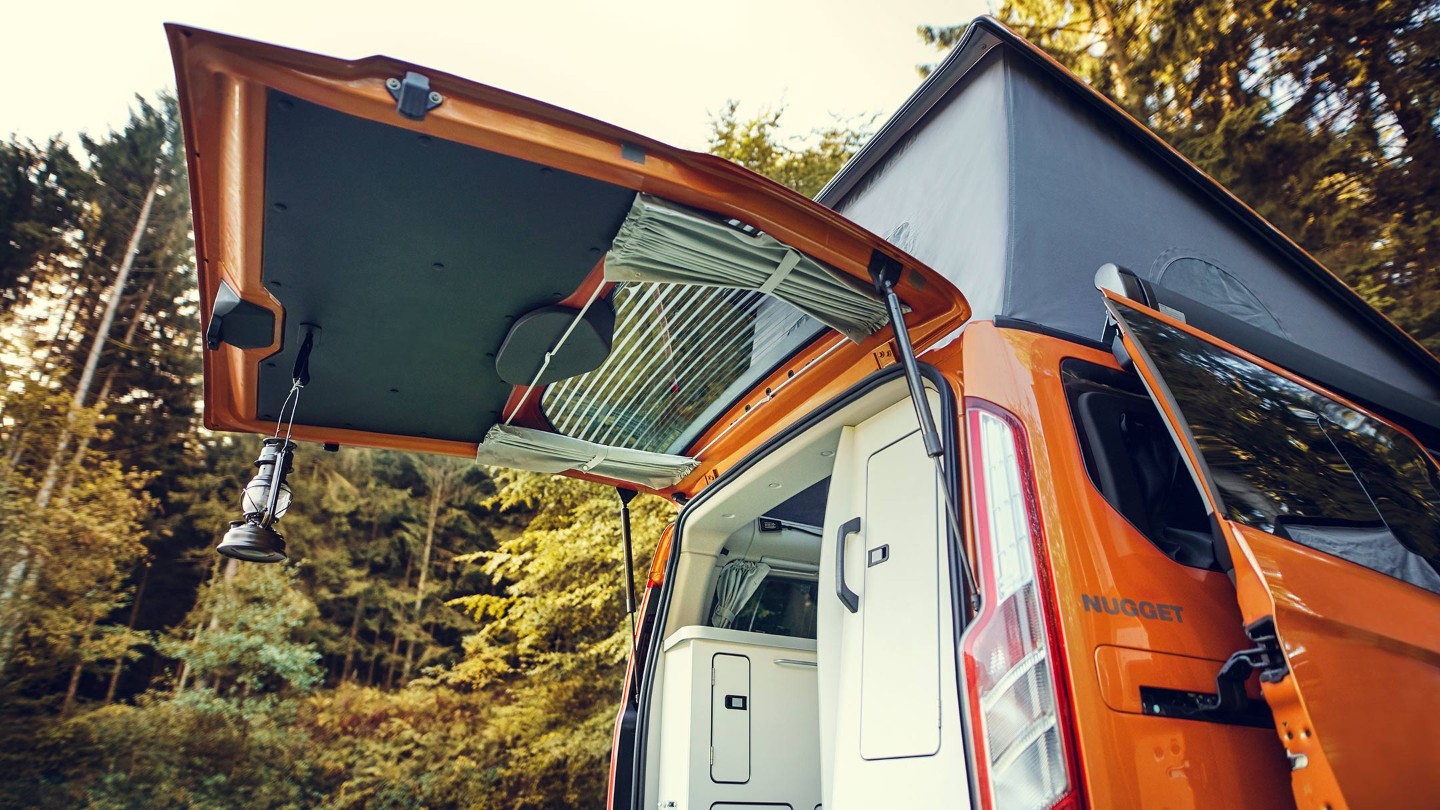 Orange Ford Transit Custom Nugget open rear lift gate Orange Ford Transit Custom Nugget open rear lift gate
