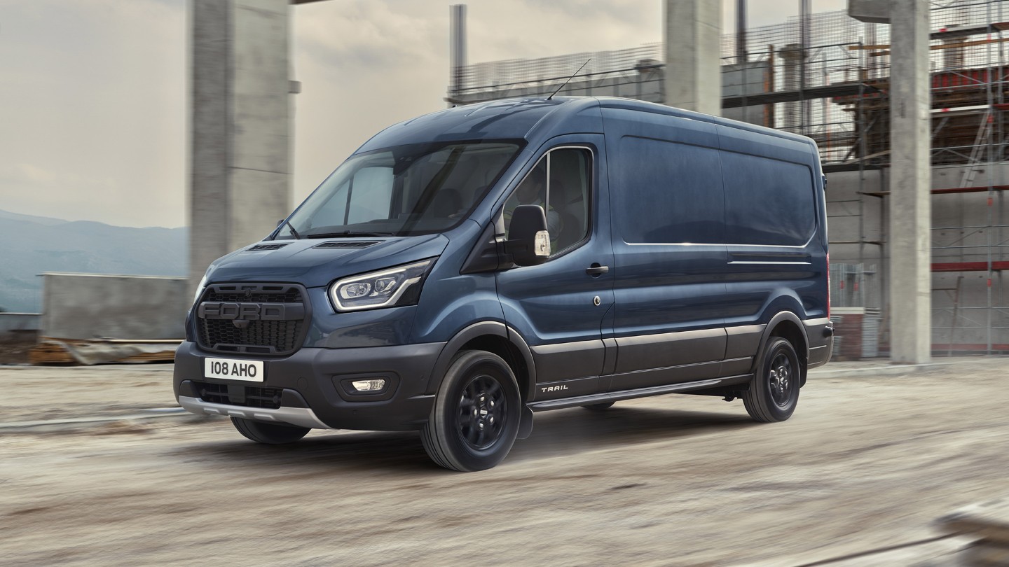 Transit Van Trail in motion in the middle of industrial estate