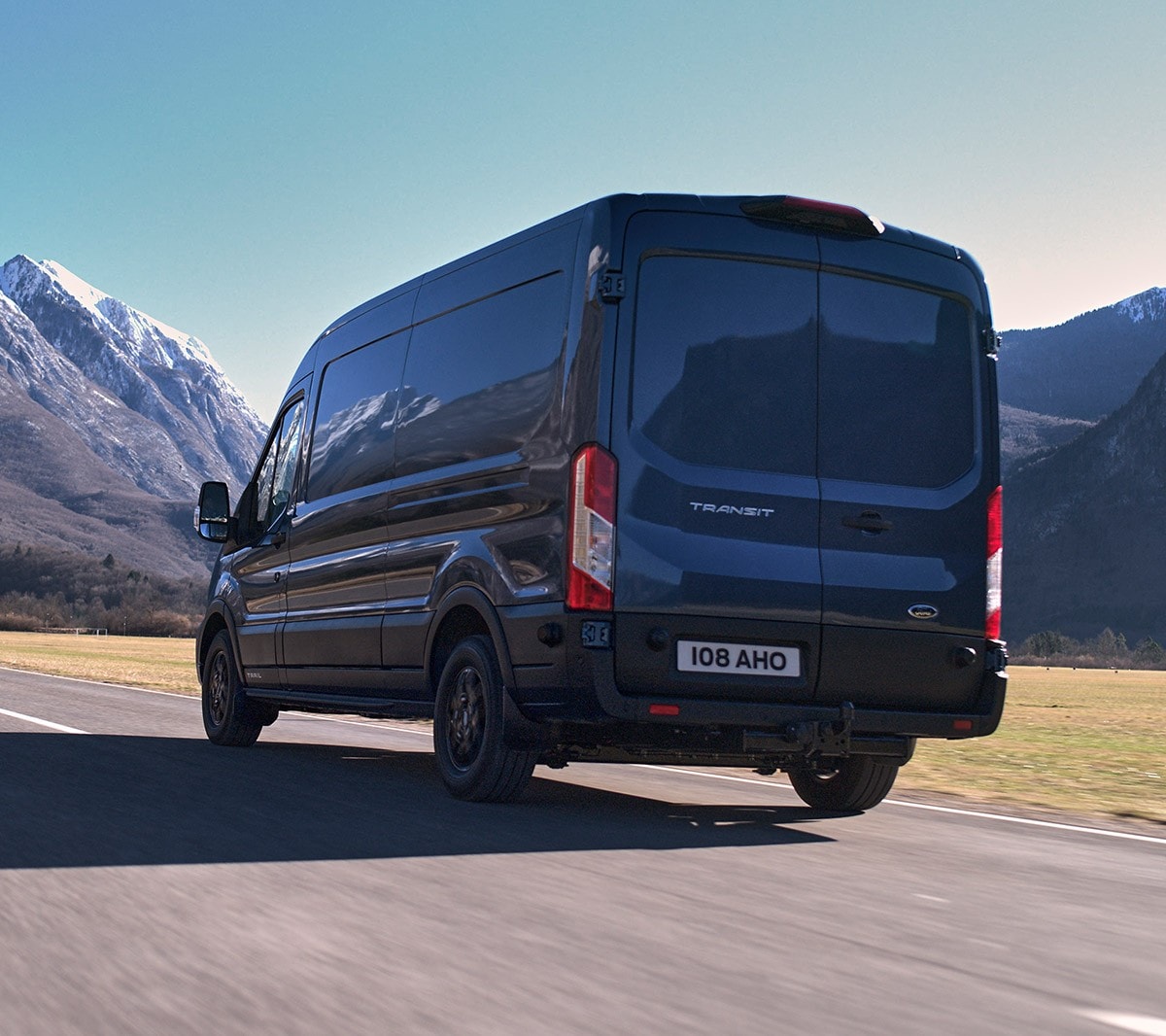 Ford Transit Van Trail driving on mountain road