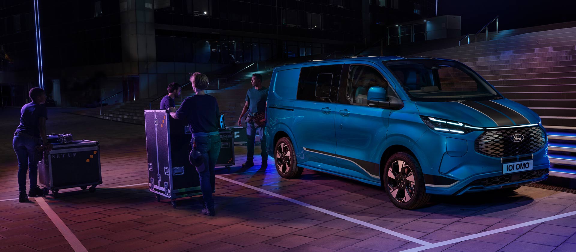 Blue Ford E-Transit Custom Sport Double Cab-in-van.