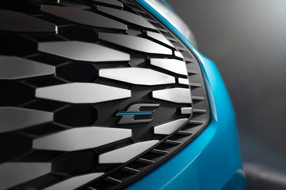 Close-up of Ford E-Transit Custom's grille.
