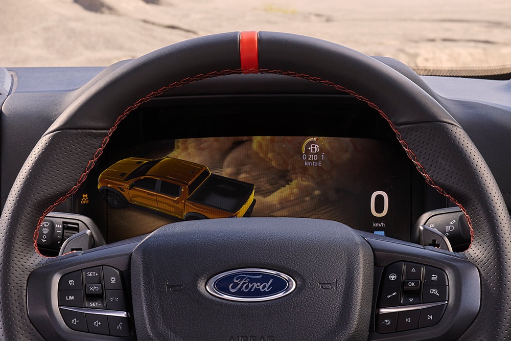 Ford Ranger Raptor steering wheel with top dead centre marker and digital dashboard display.