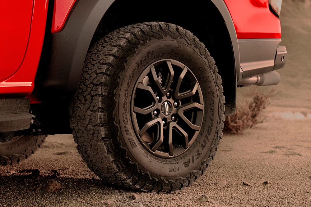 Code Orange Ford Ranger Raptor tyre and wheel detail.