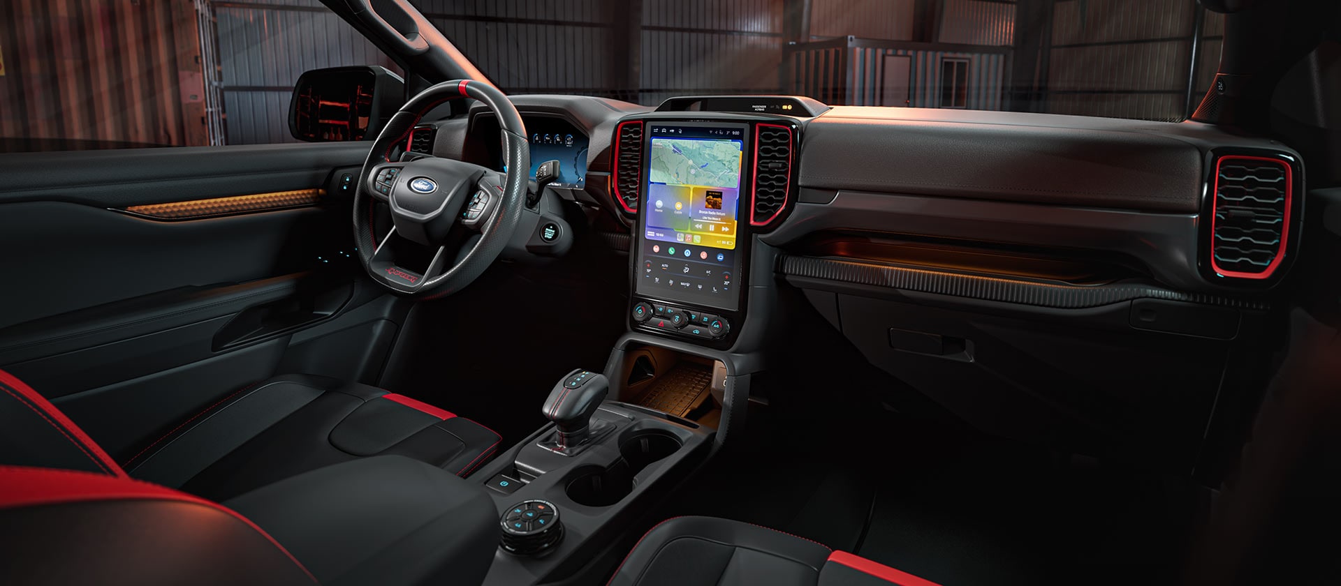 Interior view of a Ford Ranger Raptor, focusing on the vehicle's high-tech dashboard.