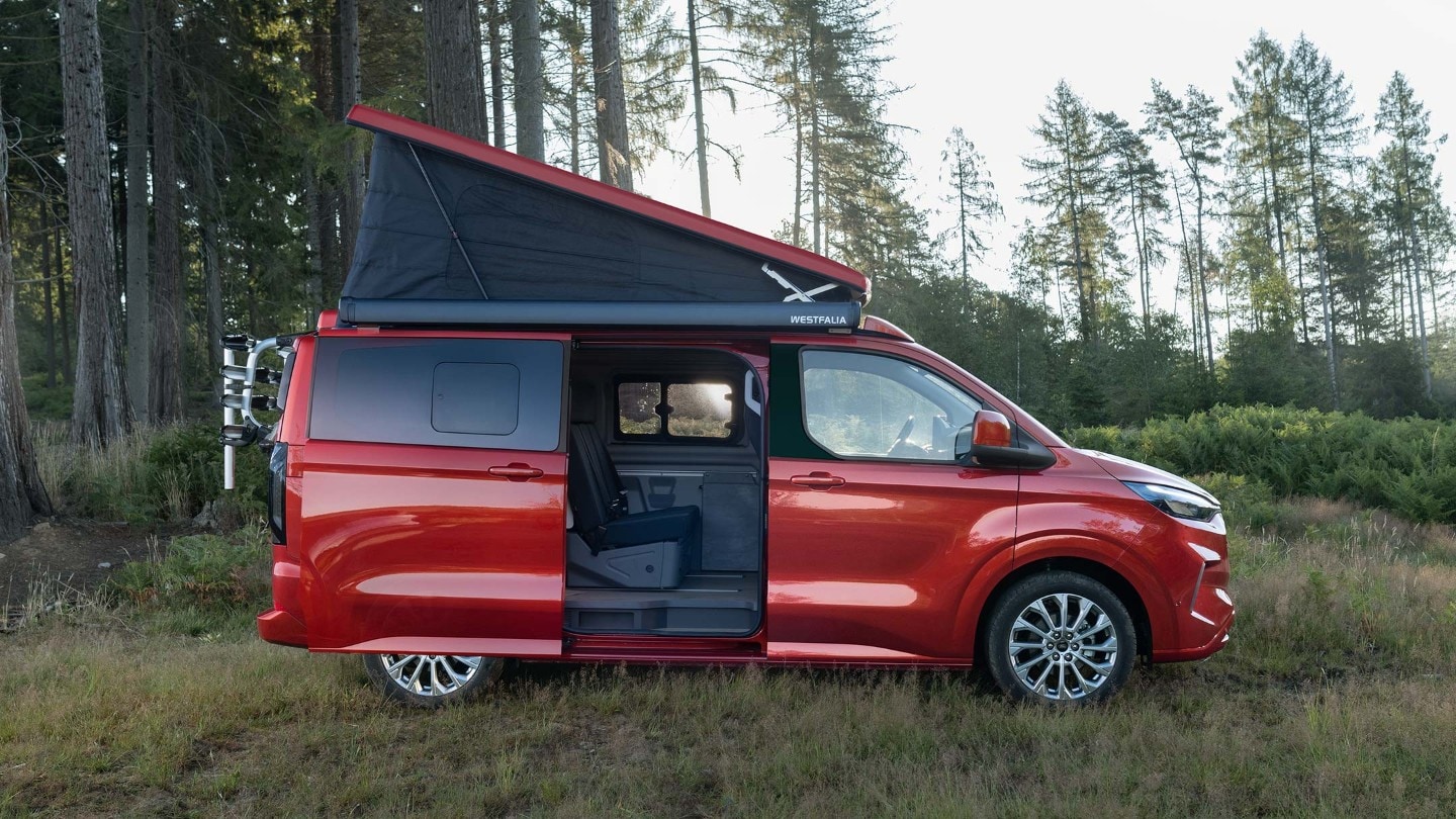 Ford Transit Custom Nugget parked in forest