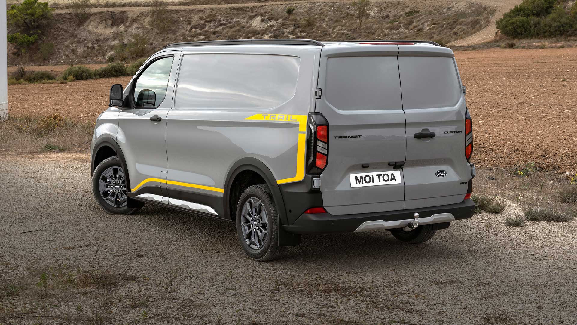 Rear view of a grey Ford Transit Custom Trail van.