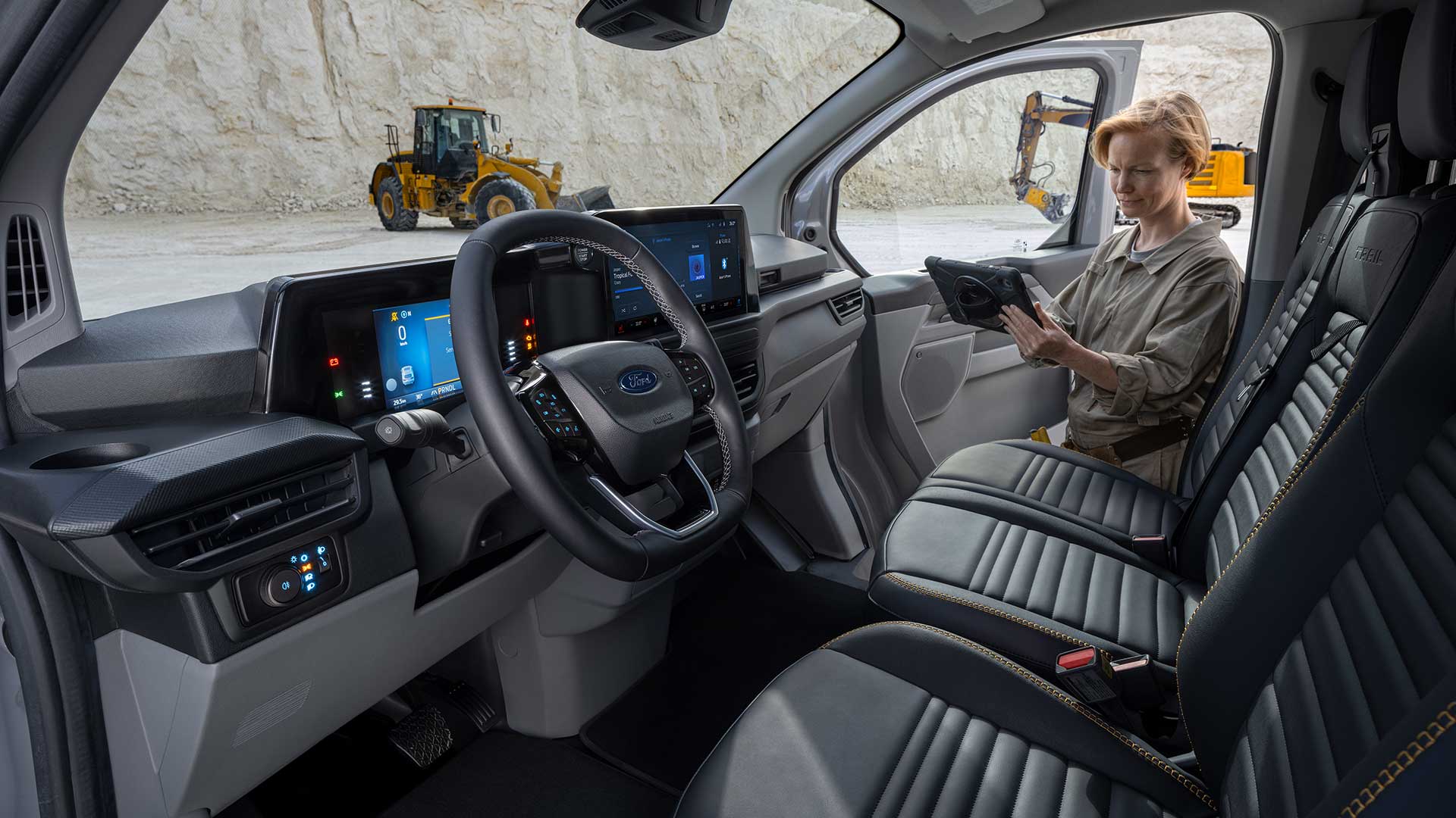 Interior of a grey Ford Transit Custom Trail van.