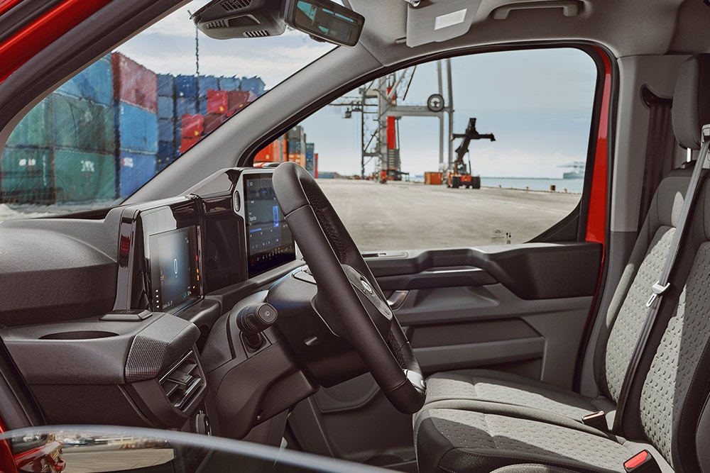 Interior of a red Ford Transit Custom van.