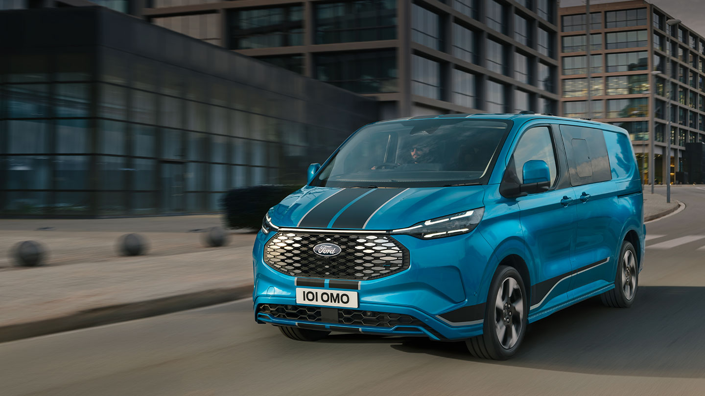 Blue Ford E-Transit Custom Sport Double cab-in-van.