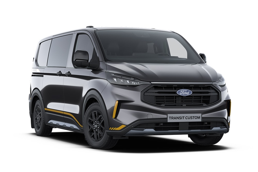 Dark grey Trail Ford Transit Custom van with gold accents.