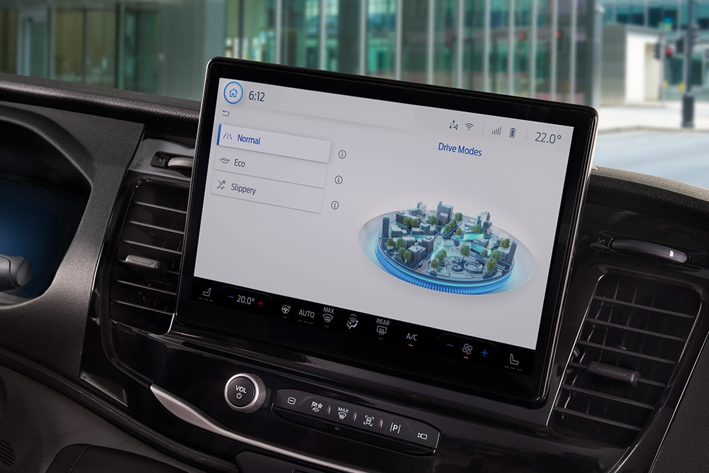 Dashboard of a Ford E-Transit electric van with a touchscreen displaying drive modes.