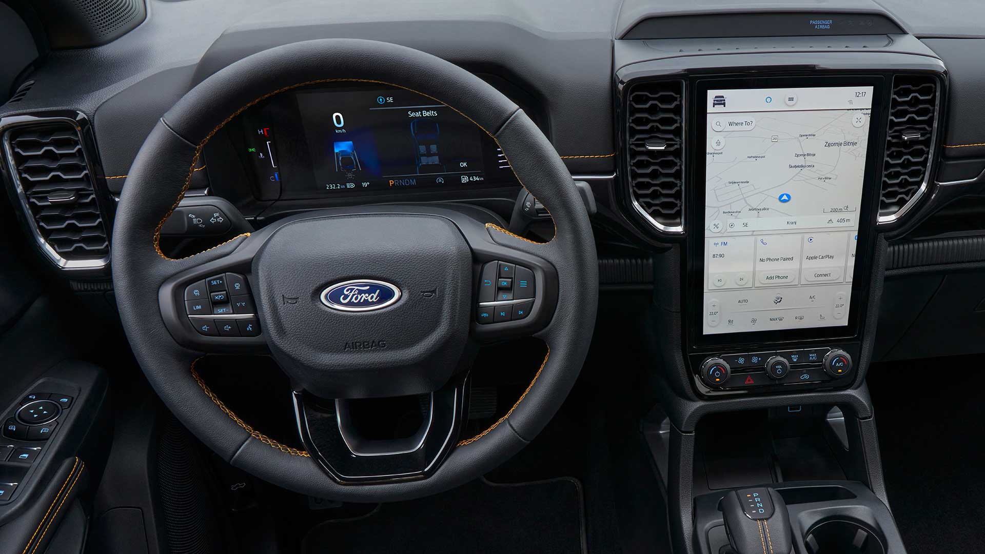 Interior view of the Ford Ranger steering wheel and central SYNC™ 4 12-inch touchscreen.