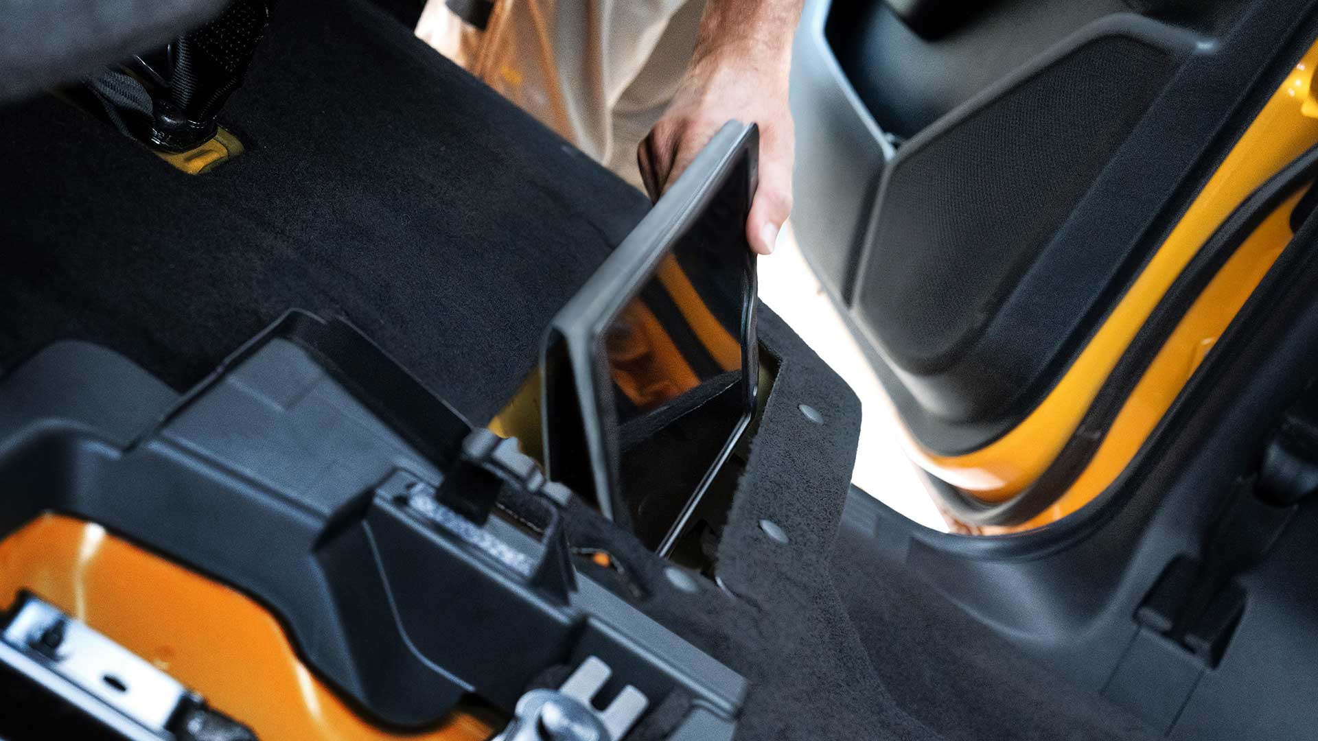 Close-up of the rear seat storage compartment inside the Ford Ranger Wildtrak.