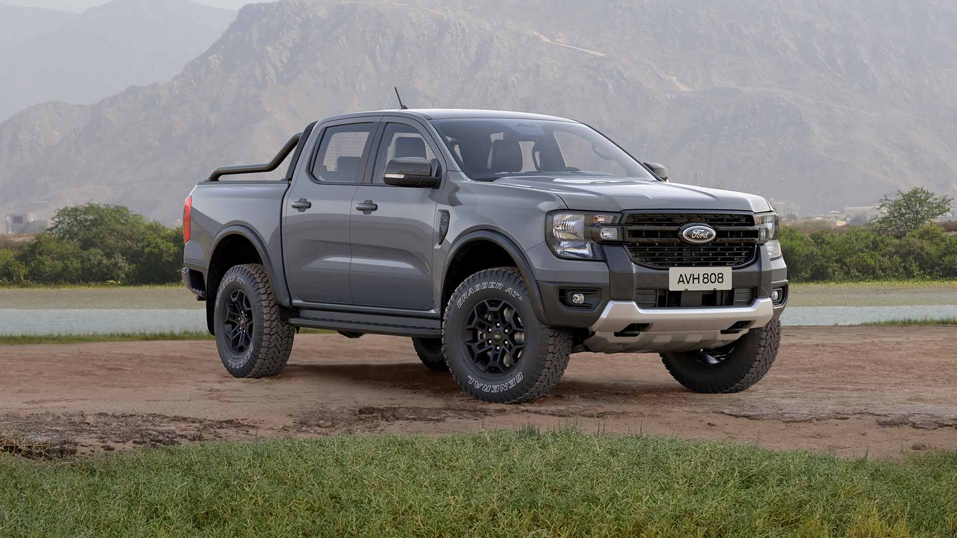 Grey Ford Ranger Double Cab driving on a dirt track.