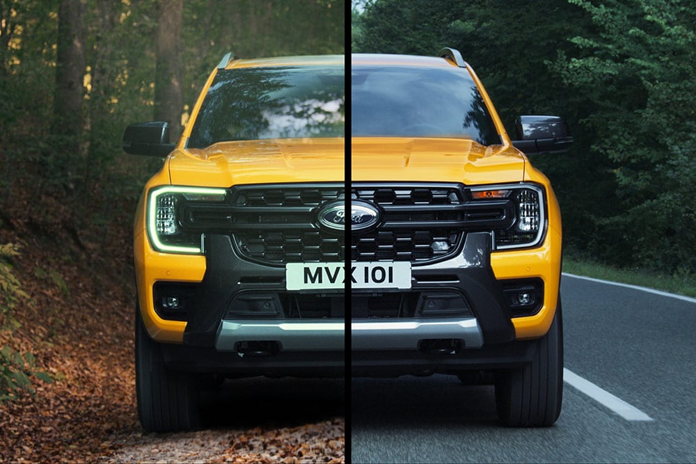 Front split-screen view of yellow Ford Ranger, split between off-road on one side and forest road on the other.
