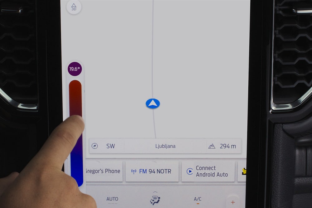Close-up of Ford Ranger dual-zone climate controls on the SYNC™ 4 12-inch touchscreen.