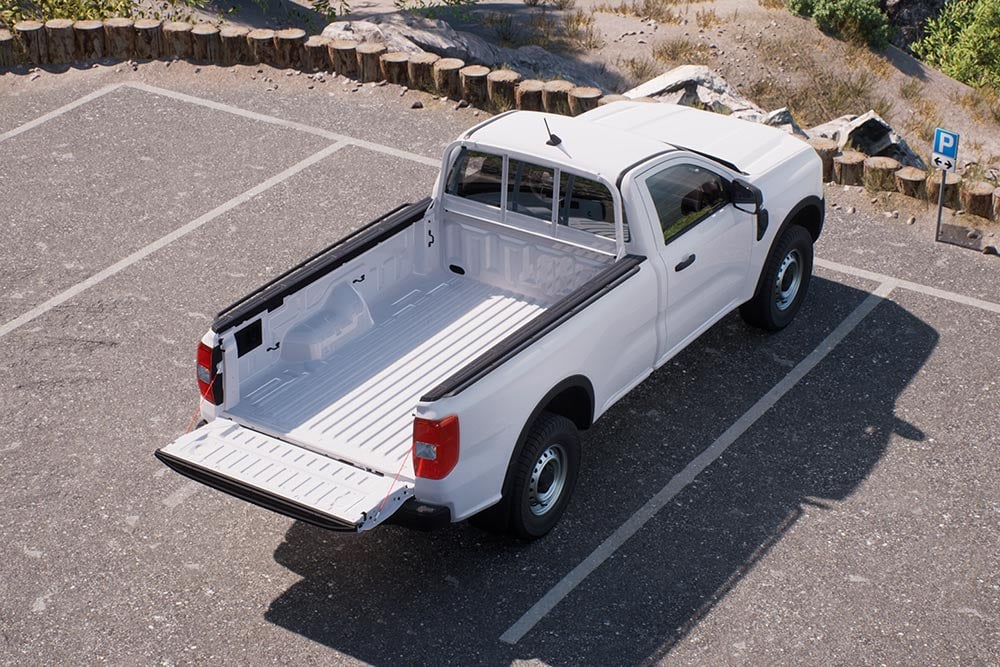 White Ford Ranger Regular Cab, rear view, with open tailgate, parked in a paved area.