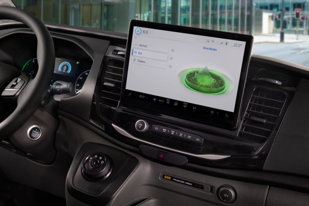  Dashboard of a Ford E-Transit van with a touchscreen displaying drive modes.