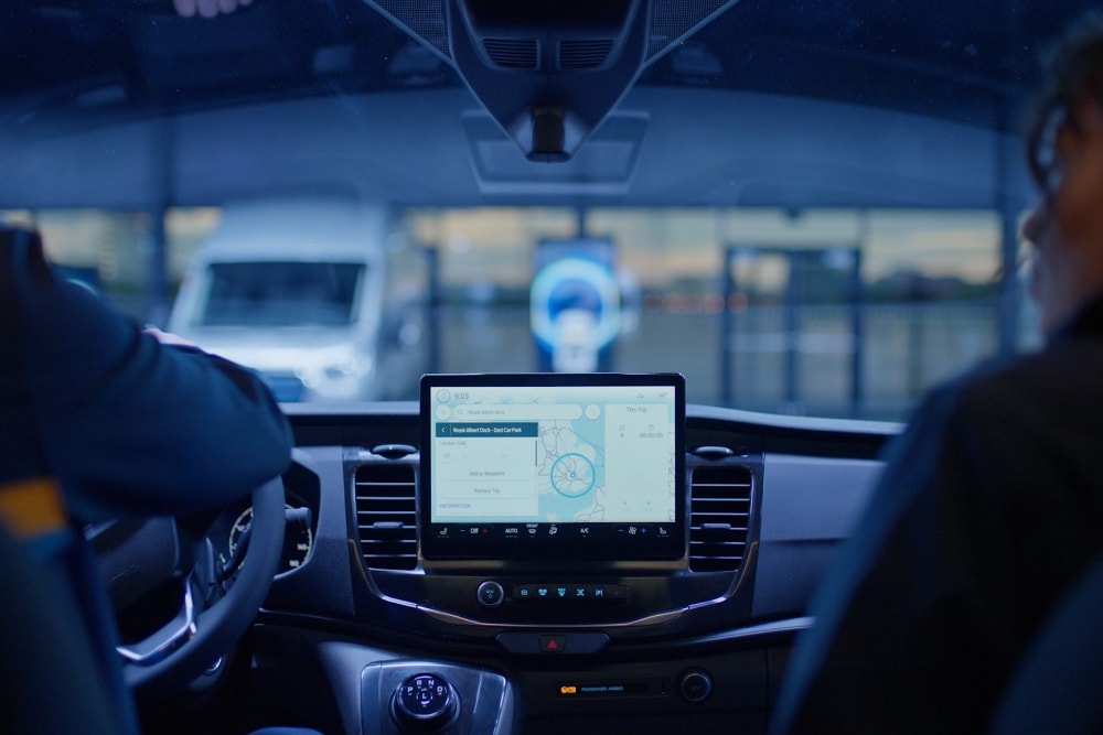  Dashboard of a Ford Transit van with a navigation system.