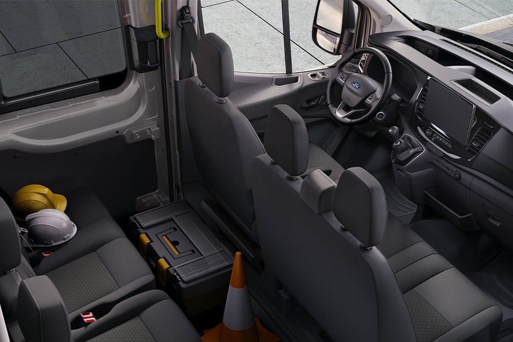  Ford Transit Double Cab interior with two rows of seats.