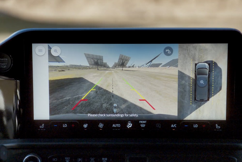 The central touchscreen in a Ford Transit van displays the 360-degree camera view.