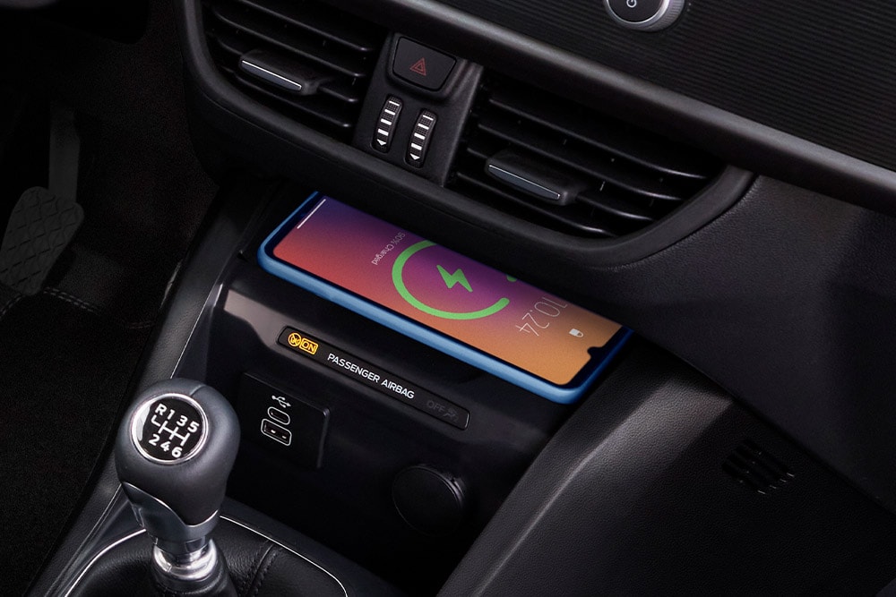 Wireless charging charging a phone in the New Ford Transit Courier